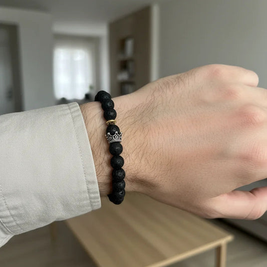 Close-up shot of a round lava stone used as an essential oil diffuser bead.
