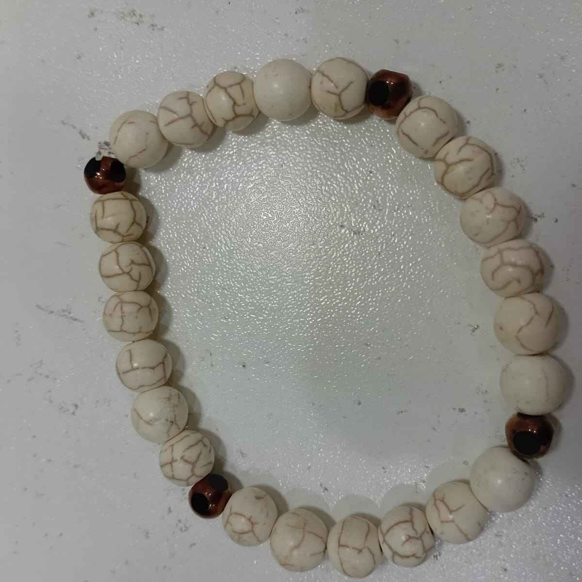 Handmade genuine howlite gemstone bracelet for stress relief and balance.
