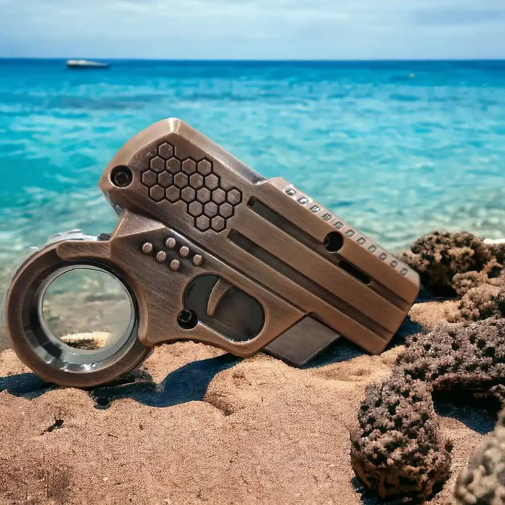 Mini Gun Shaped Lighter on The Beach
