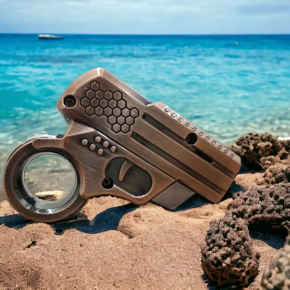Mini Gun Shaped Lighter on The Beach