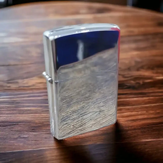Silver Spark Zippo Lighter on a table