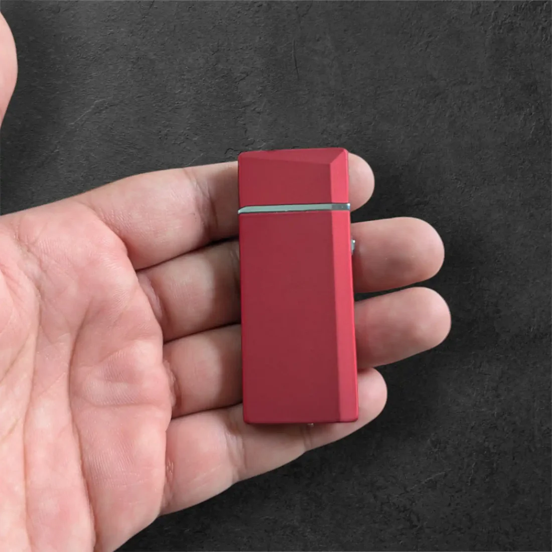 Slim Electric Lighter in man Hands