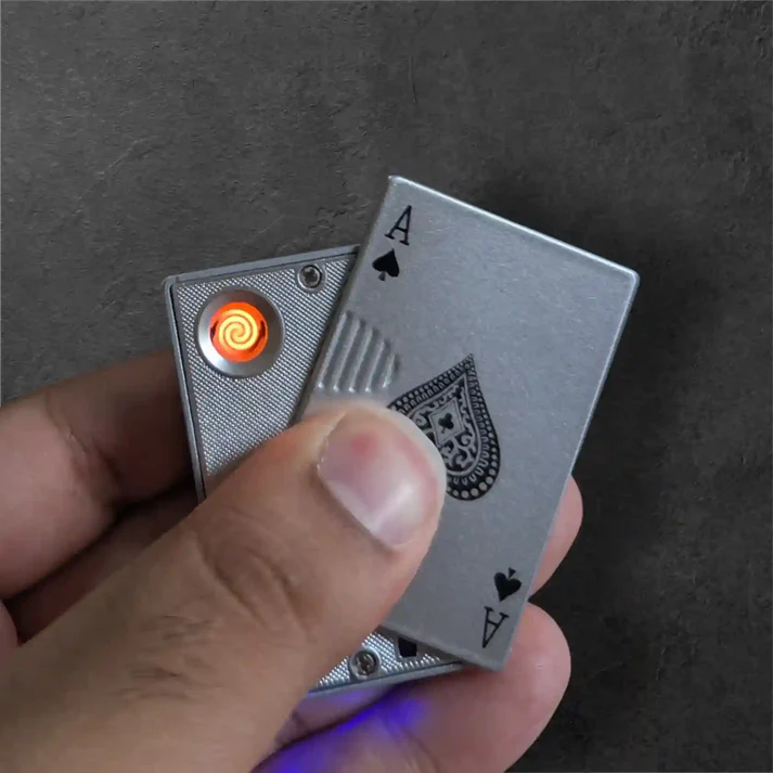 Silver Poker ace electric lighter in the ma hand
