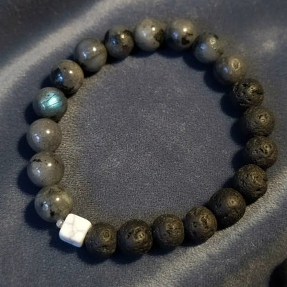 Wrist wonder  bracelet , a mx of lava beads and stone beads ronud the elastic