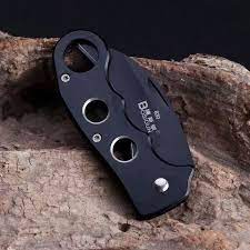 Compact karambit-style folding knife with secure grip handle